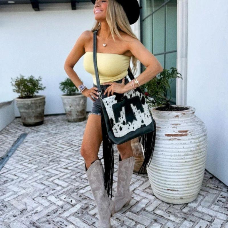Thunderbird Crossbody Bag - Genuine Leather & Cowhide - Adjustable Strap - Magnetic Closure - Spacious Interior - Unique Cowhide Pattern - Perfect for Everyday Wear