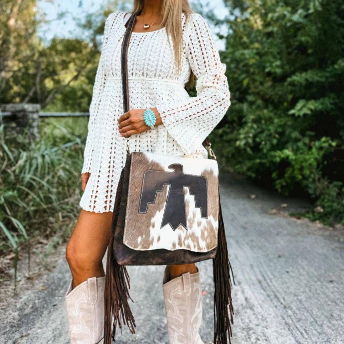Thunderbird Crossbody Bag - Genuine Leather & Cowhide - Adjustable Strap - Magnetic Closure - Spacious Interior - Unique Cowhide Pattern - Perfect for Everyday Wear