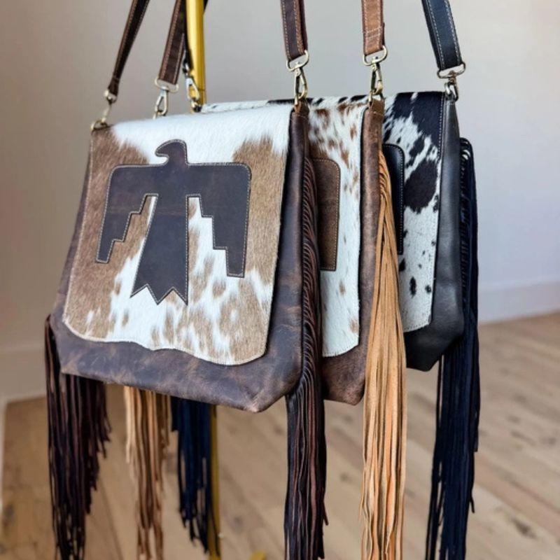 Thunderbird Crossbody Bag - Genuine Leather & Cowhide - Adjustable Strap - Magnetic Closure - Spacious Interior - Unique Cowhide Pattern - Perfect for Everyday Wear